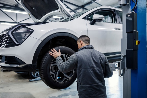 Mechanic repairing vehicle - Auto Repair Shop Insurance
