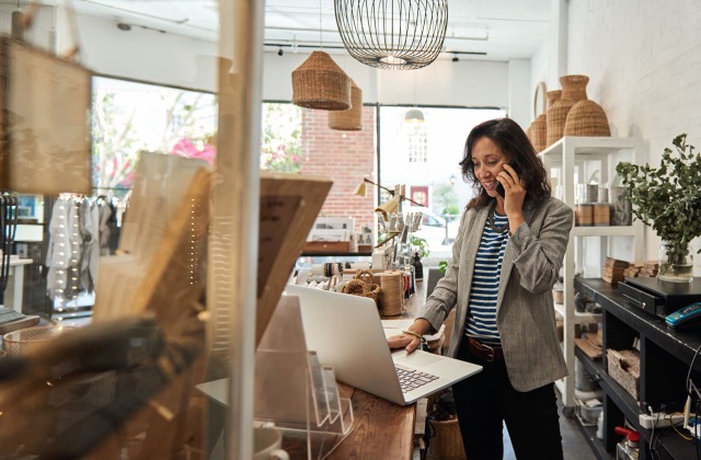 Woman running a store - Commercial Property Insurance Texas