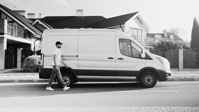Man walking to delivery van, commercial auto insurance in Cedar Park TX
