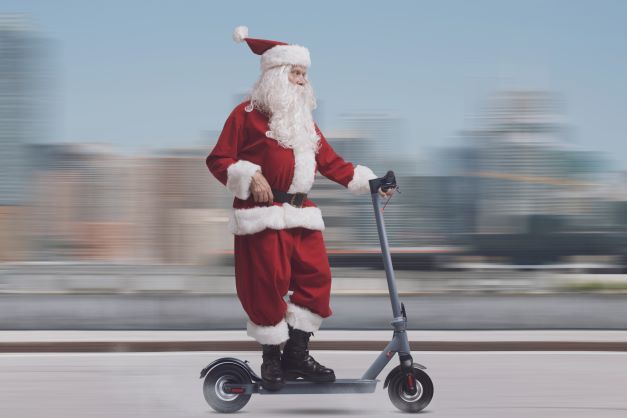 Santa on a Electric Scooter - Ebike, Scooter Hoverboard Insurance TX