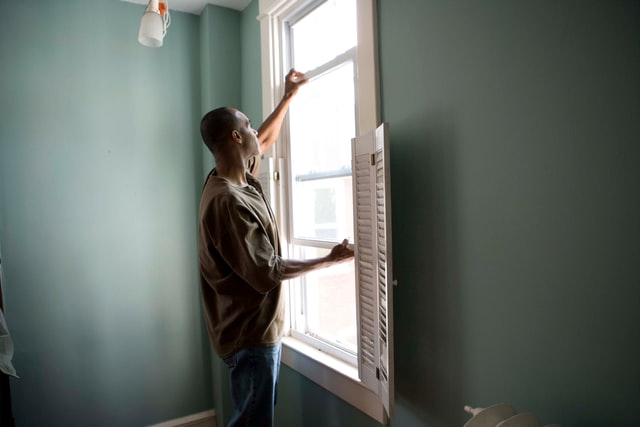Home care - man checking window