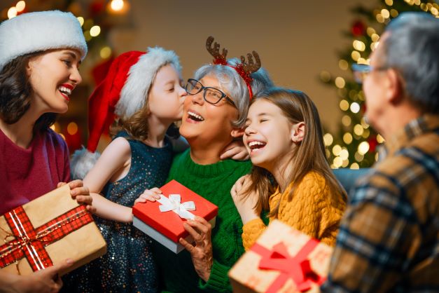 Family Opening Christmas Presents - Insuring the Holidays TX