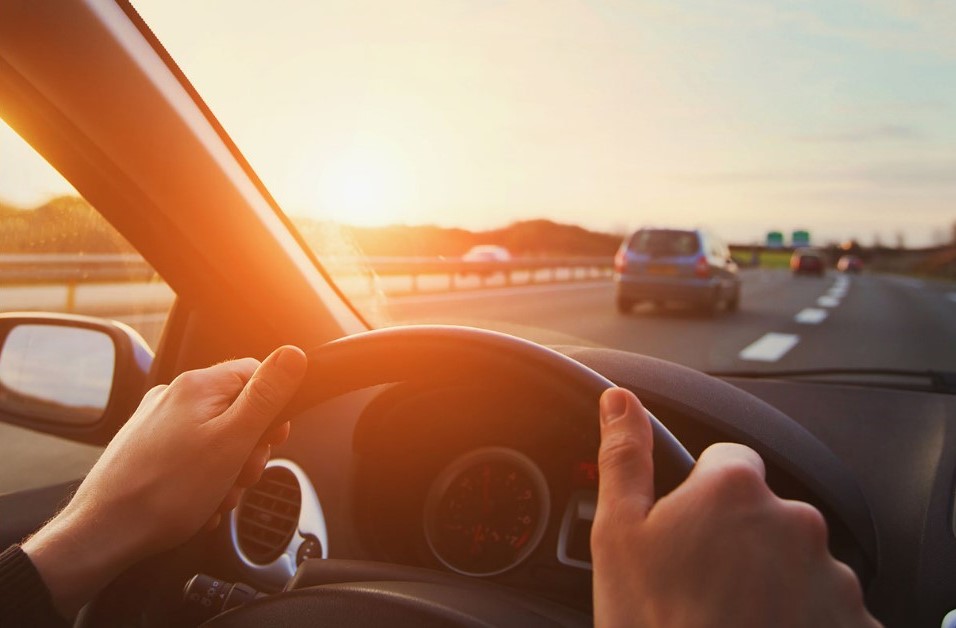 Hands on steering wheel, telematics discounts on car insurance in Texas