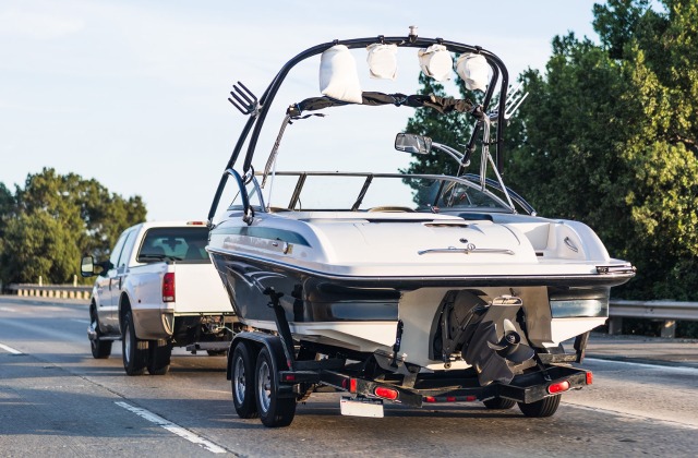Truck towing boat - Trailer Safety Week - Trailer Insurance TX