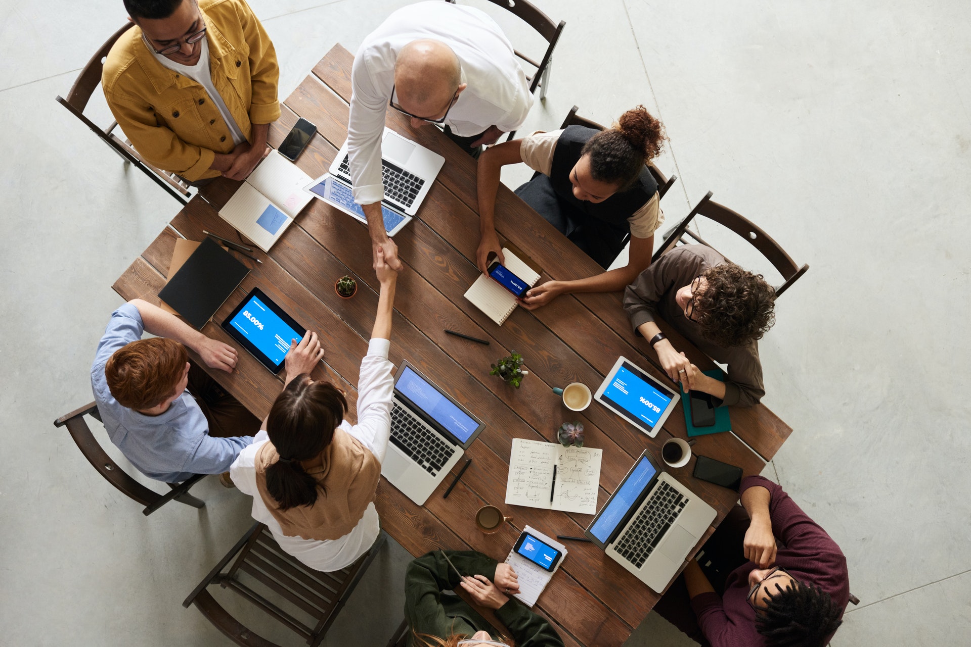 Business leaders sitting around a table